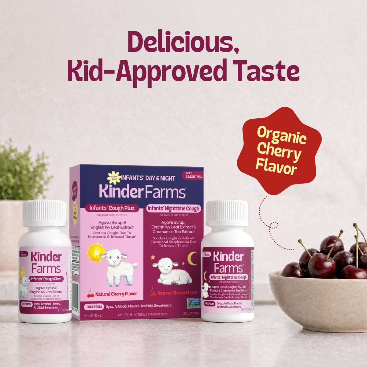 A value box and two bottles of KinderFarms Infants' Cough medicine next to a bowl of fresh cherries, with text highlighting the organic cherry flavor and kid-approved taste. (Item 6 of 7)